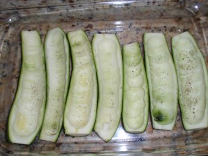 hollowed out zucchinis ready to be filled with stuffing